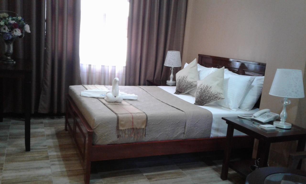 Charos Dormitel Hotel Dumaguete City Exterior photo