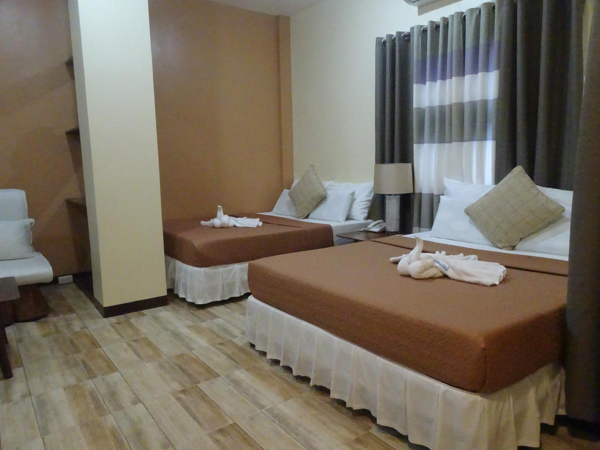 Charos Dormitel Hotel Dumaguete City Exterior photo