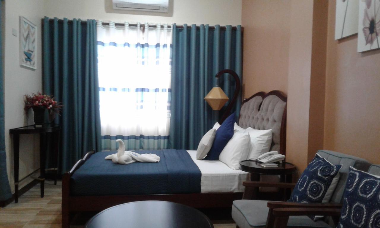Charos Dormitel Hotel Dumaguete City Exterior photo